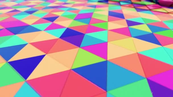 Animación en movimiento abstracto de triángulos tridimensionales multicolores brillantes. Lazo inconsútil 3d render — Vídeo de stock