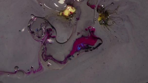 Liquid Colorful Paint pattens mix in slow motion. Liquid color paint patterns texture top view. Multicolor liquid paint surface. — Stock Video