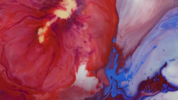 Bright colorful acrylic paints mix into abstract pigments in slow motion. Abstract color moving background close up macro — Stock Video