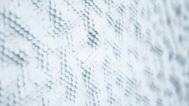 Abstract white minimalistic background made of plastic hexagons with shallow depth of field. Light minimal hexagonal grid pattern animation in modern clean white. Seamless loop 3d render