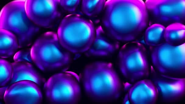 Abstraites boules squishy colorées se déplacent et interagissent les uns avec les autres avec la pression interne en essayant de trouver une place pour eux-mêmes. Lumière moderne de spectre de couleur ultraviolette . — Video