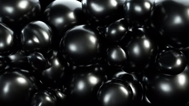 Абстрактные черные мячи двигаются и взаимодействуют друг с другом с внутренним давлением, пытаясь найти место для себя . — стоковое видео