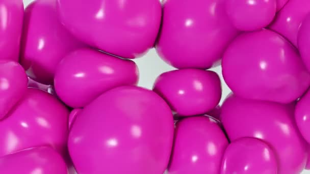 Abstract colorful pink squishy balls move and interact with each other with internal pressure trying to find a place for themselves. — Stock Video