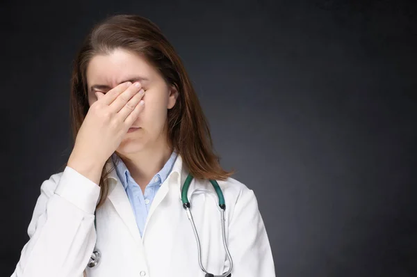 Tired female doctor — Stock Photo, Image