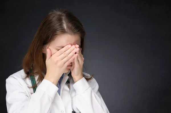 Tired female doctor — Stock Photo, Image