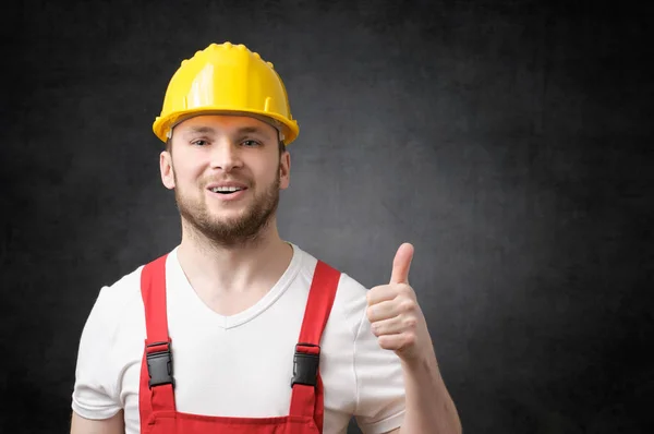Happy worker showing thumbs up sign — Stock Photo, Image