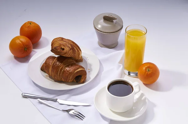 Fresh Croissants Orange Juice Coffee Oranges Continental Breakfast White Table — Stock Photo, Image