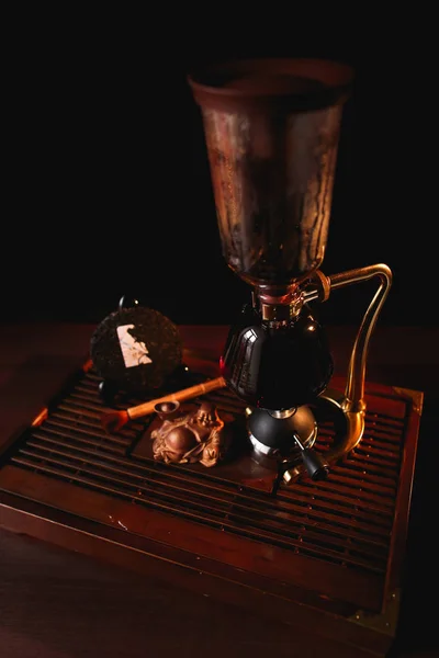 Puer čaje v sifonu s extrudovaný palačinka Shu Puer — Stock fotografie