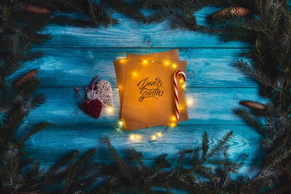 Letter to Dear Santa on a blue wooden table — Stock Photo, Image