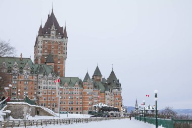 View of Frontenac Castle in winter under the snow clipart
