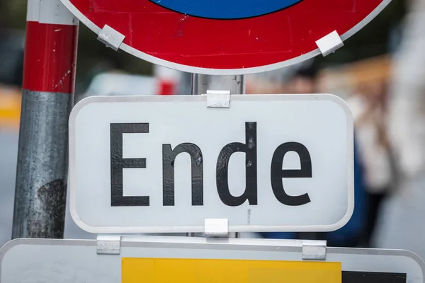 Roadsign in german language with the mention Ende. In German, Ende stands for the end, as this road sign indicates the place where some parking authorization finishes