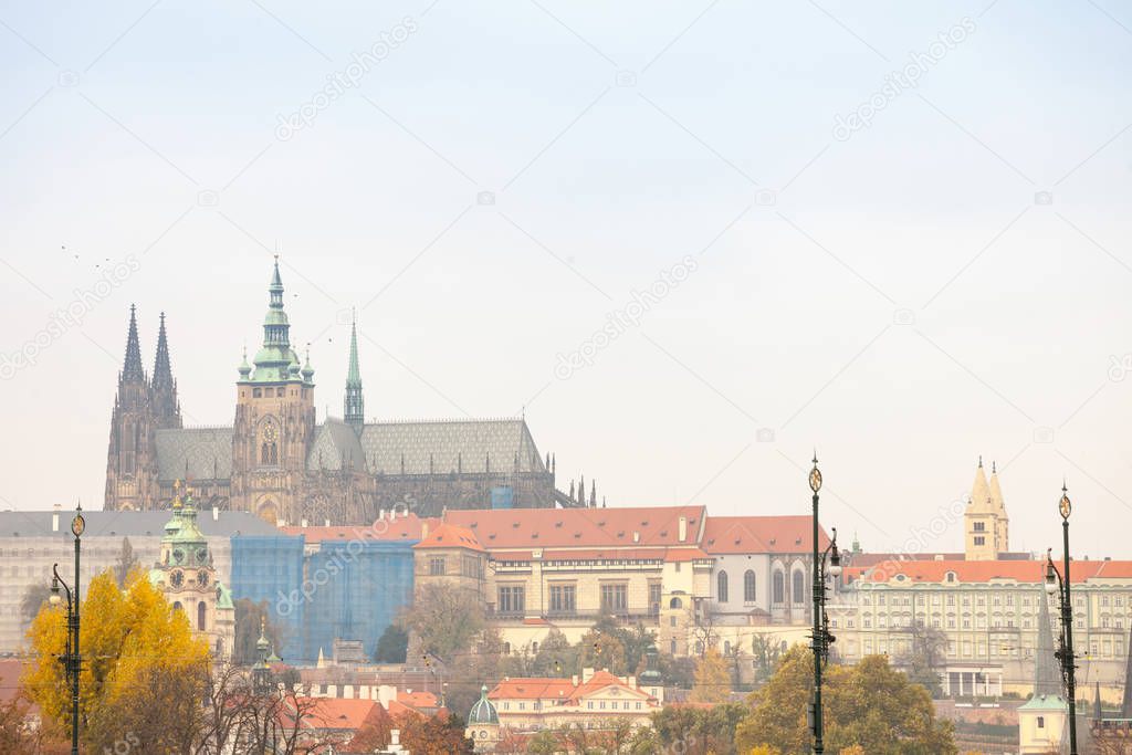 Panorama of the Old Town of Prague, Czech Republic, with a focus on Hradcany hill and the Prague Castle with the St Vitus Cathedral (Prazsky hill) seen from the Vltava river. It is the main landmark of the city