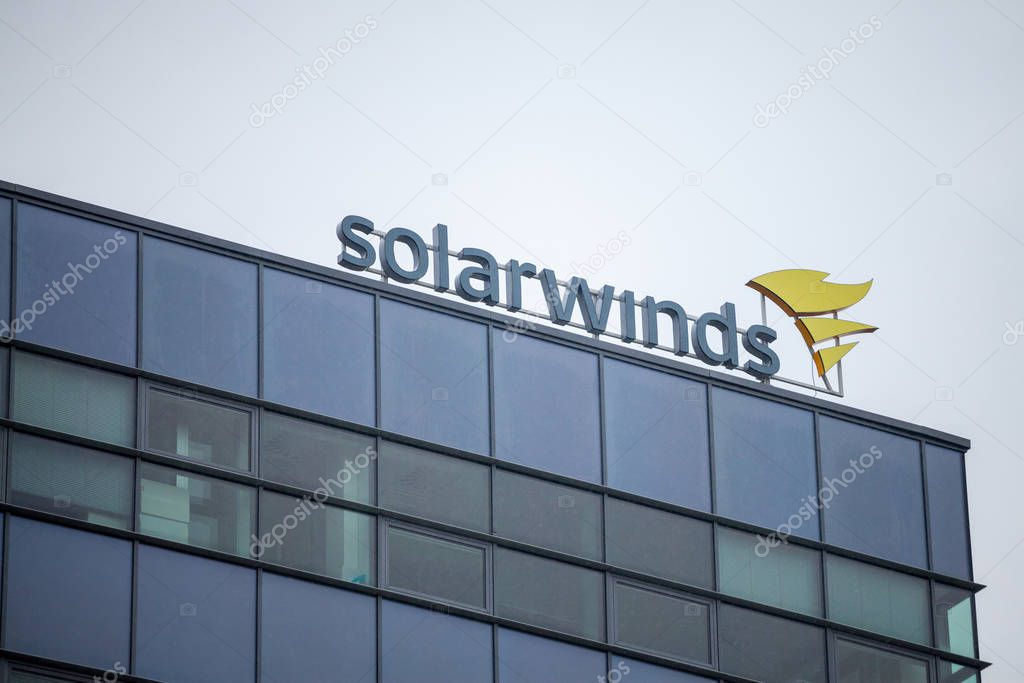 BRNO, CZECHIA - NOVEMBER 5, 2019: SolarWinds logo in front of their office for Brno. SolarWinds is an american IT company specialized in Software development for network infrastructure
