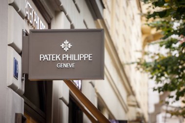 PRAGUE - CZECHIA - NOVEMBER 1, 2019:  Patek Philippe logo on their jewelry boutique in Prague. Patek Philippe is a Swiss luxury watchmaker famous for chronographs and watches clipart