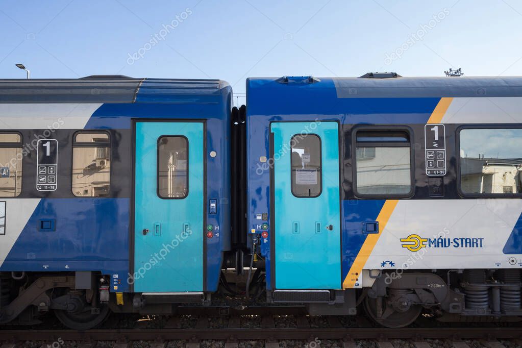 BRNO, CZECHIA - NOVEMBER 6, 2019: Mav Start logo on one of their passenger cars in an international train. Mav Start is the national Hungarian Railways carrier