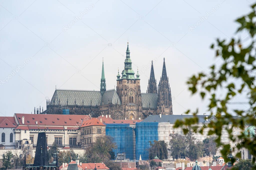 Panorama of the Old Town of Prague, Czech Republic, with a focus on Hradcany hill and the Prague Castle with the St Vitus Cathedral (Prazsky hill) seen from the Vltava river. It is the main landmark of the city