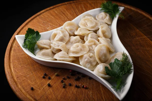 Boiled dumplings with herbs — Stock Photo, Image