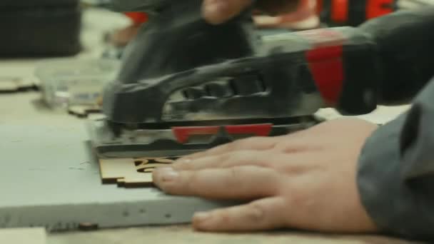 Close-up of male hands a professional grinding machine manufactures the cleaning products. — Stock Footage Close-up of male hands a professional grinding machine manufactures the cleaning products. Video Clip
