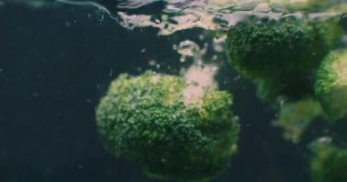 Broccoli Under water with air bubbles and in slow motion. Fresh and juicy healthy vegetarian product