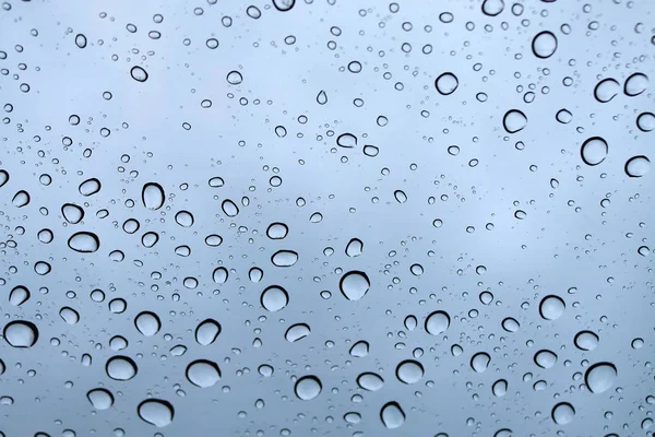 Wasser, Regentropfen auf Glas. — Stockfoto