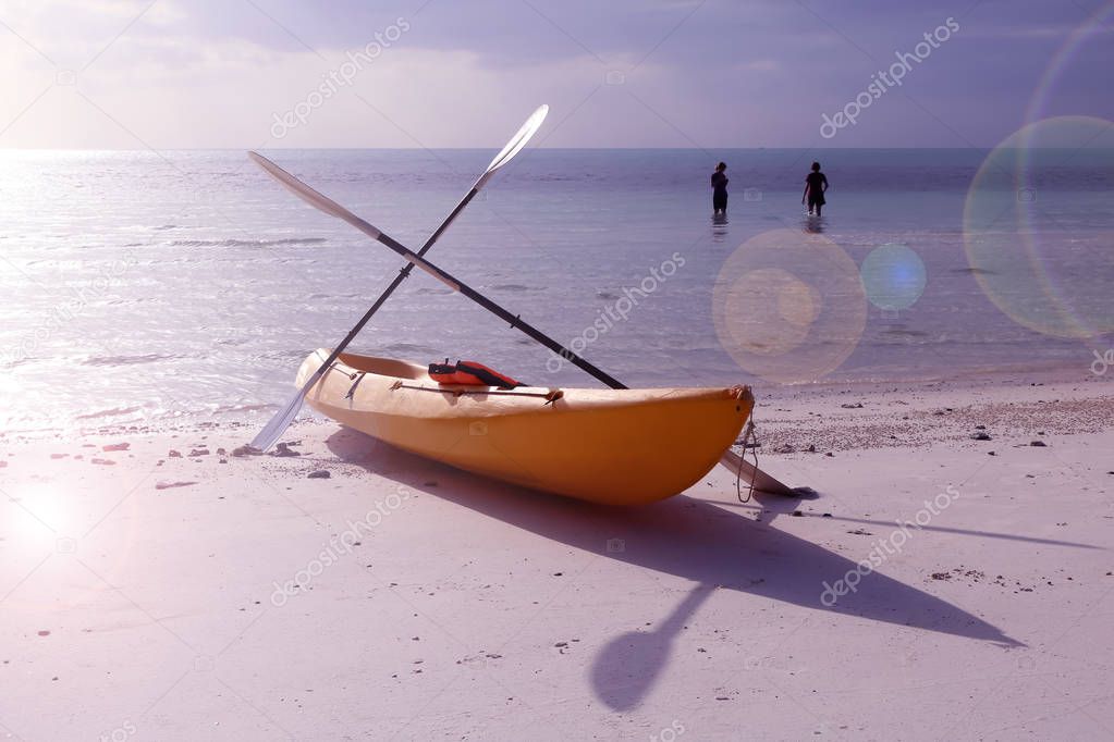 Kayaking on the beach in archipelago island.