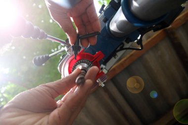 Worker with Drill presses machine for industry  clipart