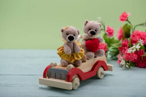Valentines Day. Love heart. Couple Teddy Bears on the car. Handmade toys. An offer of marriage. Vintage retro romantic style. Family, wedding and friendship
