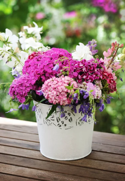 Basket with beautiful flowers — Stock Photo, Image