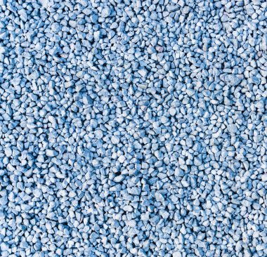 Beyaz gri mavi renk karışımı arka plan görüntüsü ile zeminde taş çakıl