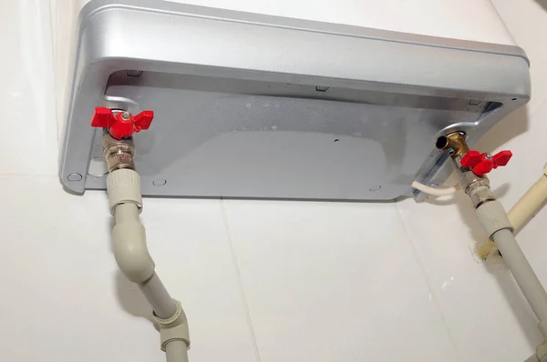 Plumbing Connection of home water heater. Fixing electric water heater (boiler). Individual heating. Individual hot water supply