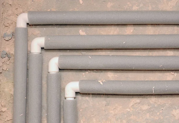 plumbing pipes. insulation around the pipe. Domestic plumbing connections