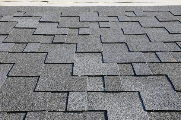 Close up view on Asphalt Roofing Shingles Background. Roof Shingles - Roofing. Bitumen tile roof. — Stock Photo, Image