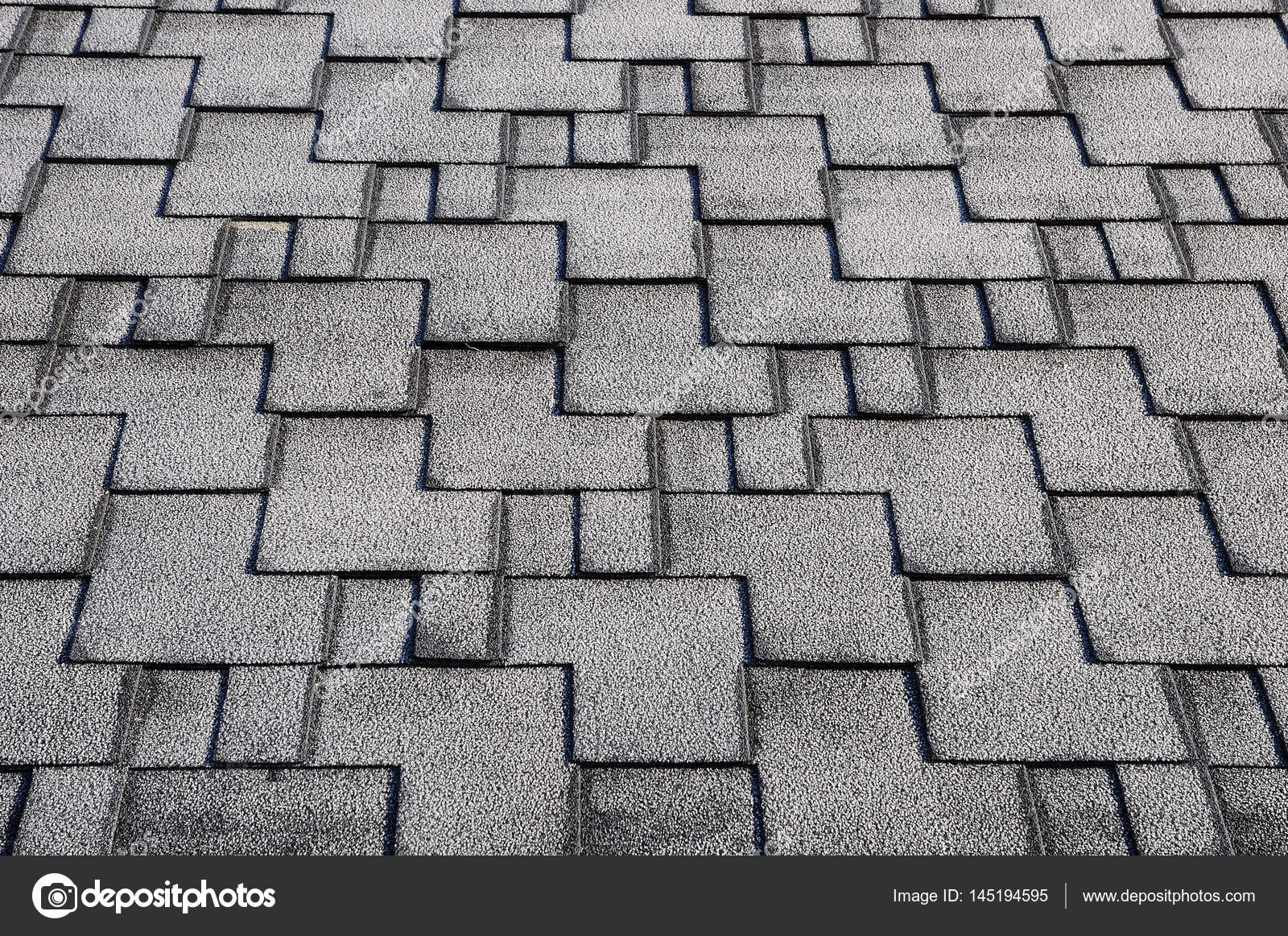 Close up view on Asphalt Roofing Shingles Background. Roof Shingles