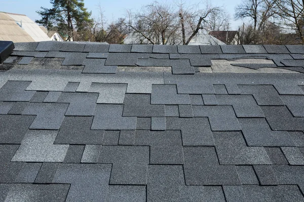 A close up view of shingles a roof damage. Roof Shingles - Roofing. — Stock Photo, Image
