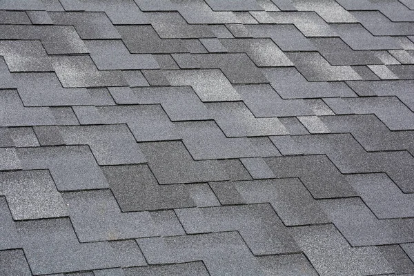 Close up view on Asphalt Roofing Shingles Background. Roof Shingles - Roofing. Bitumen tile roof. — Stock Photo, Image