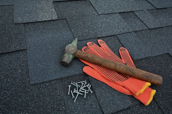 Asphalt Roofing Shingles Background. Roof Shingles - Roofing. Asphalt Roofing Shingles Hammer, Gloves and Nails