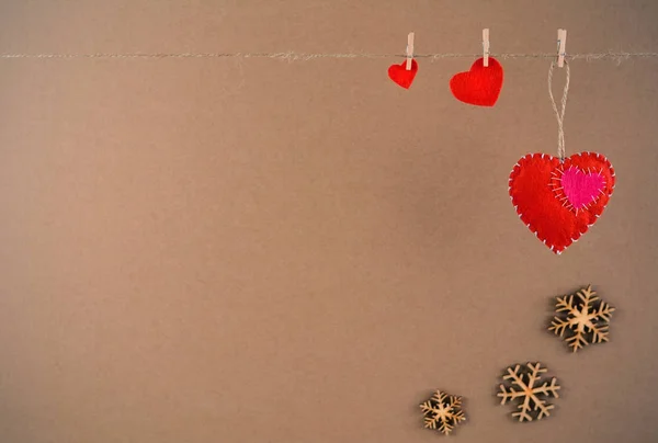 Valentine background with felt hearts on clothespins. Happy Valentine\'s day.