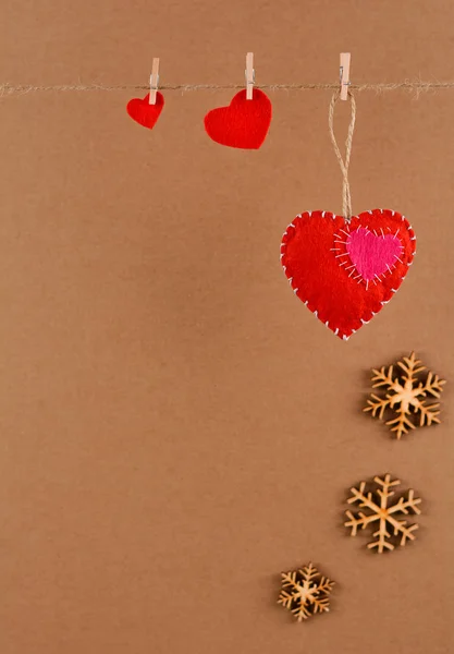 Happy Valentine\'s day. Valentine background with felt hearts on clothespins