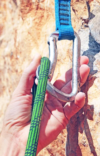 A climbers rope and quick-draws. Climbing and mountaineering sport concept