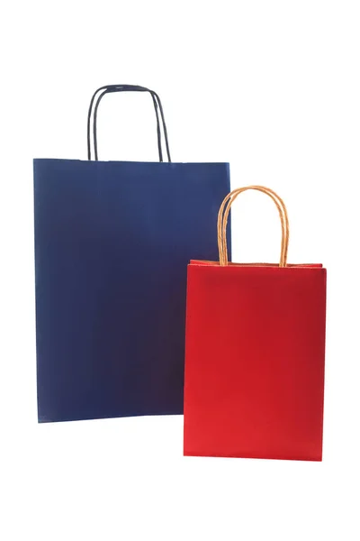 Ökológiai újrafeldolgozás papír csomagok, kék és piros papír táskák — Stock Fotó