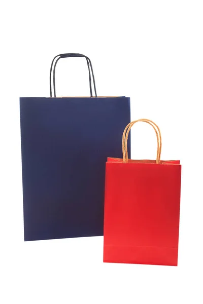 Imballaggi ecologici di carta riciclata, sacchetti di carta blu e rossi — Foto Stock