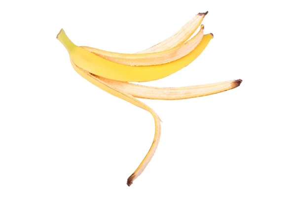 Gele bananenschil op een witte achtergrond — Stockfoto