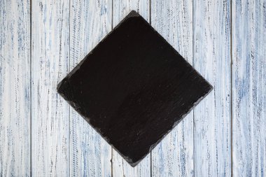 ahşap arka plan siyah arduvaz kurulu