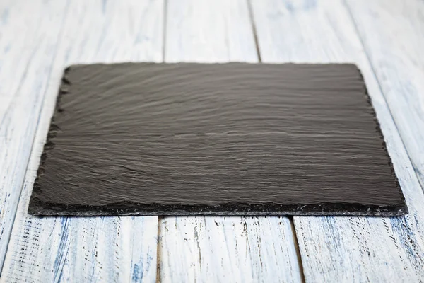 ahşap arka plan siyah arduvaz kurulu