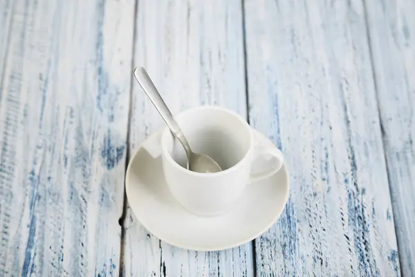 White coffe cup on light wooden background — Stock Photo, Image