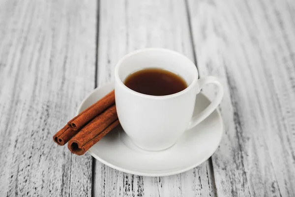 White coffe cup on light wooden background — Stock Photo, Image