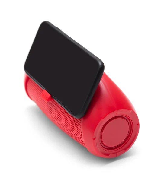 Alto-falante telefone celular vermelho detém smarthone isolado no branco — Fotografia de Stock