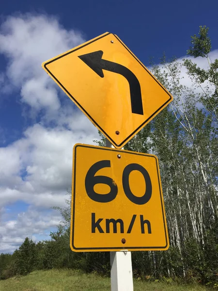 Suggested Sixty Kilometer Per Hour Sign Around Bend — Stock Photo, Image