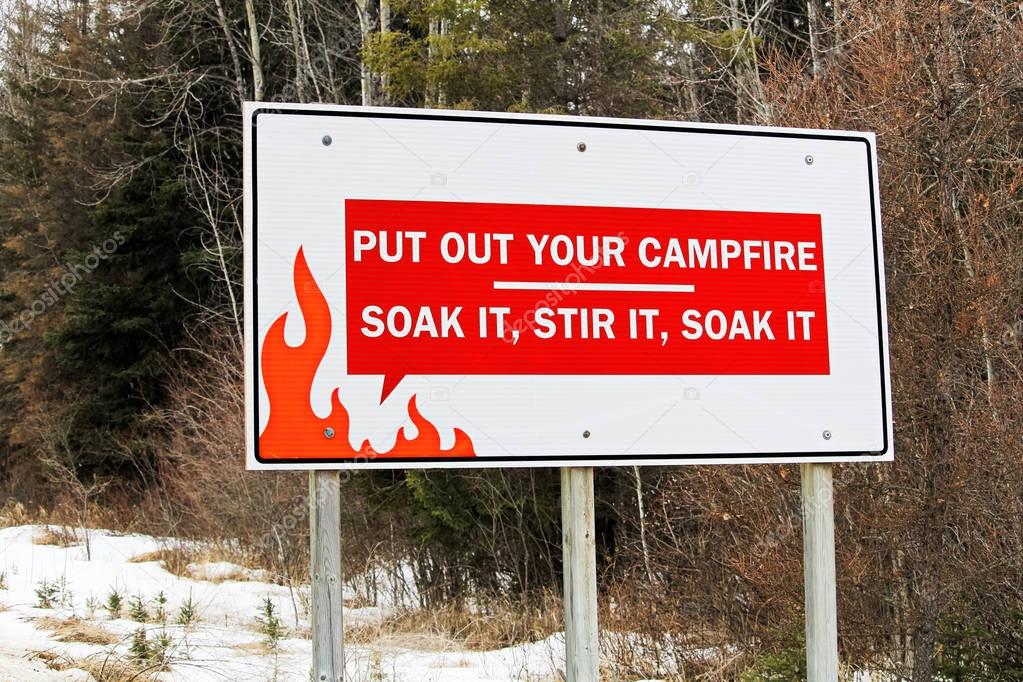 Reminder about putting out campfire sign