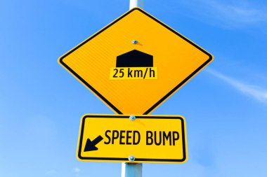 Speed bump sign with speed recommendation clipart